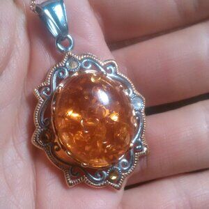 Discounted Orange Stone, Crystal Silvertone and Stainless Steel Pendant Necklace